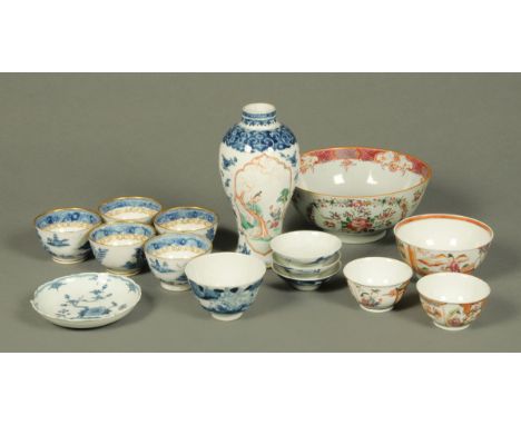 Fifteen pieces of principally Chinese porcelain, 12 tea bowls, shallow bowl and vase.  Vase height 20 cm.  CONDITION REPORT: 