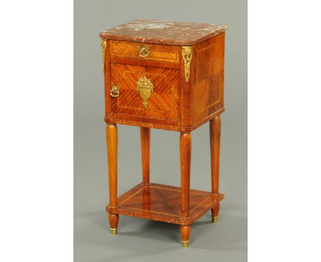 A Continental kingwood and crossbanded bedside cabinet, with marble top with rounded corners, with applied metal mouldings an