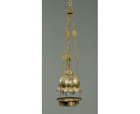 * An Ottoman hanging lamp, converted to electricity, silver coloured metal over brass.  Overall height 70 cm.  CONDITION REPO