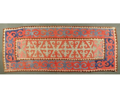 * A floor felt, Kirghizstan, acquired 1958.  147 cm x 354 cm (see illustration). CONDITION REPORT: This rug was on the floor 