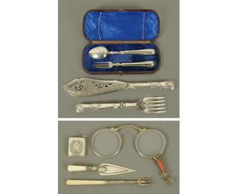 A cased silver christening set, fork and spoon, Birmingham 1875, and a pair of fish servers with silver plated blades and sil