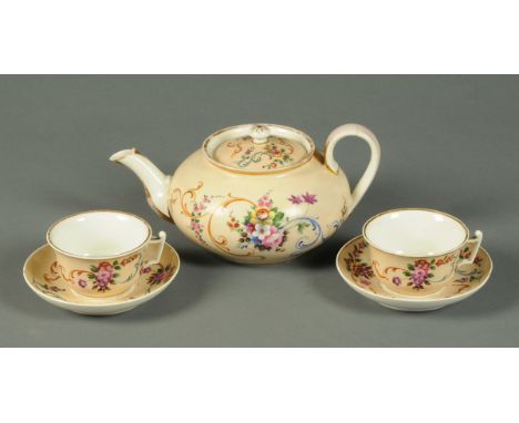 A 19th century Russian teapot, two cups and two saucers, one cup bearing label "Popov 1860". CONDITION REPORT: The teapot has