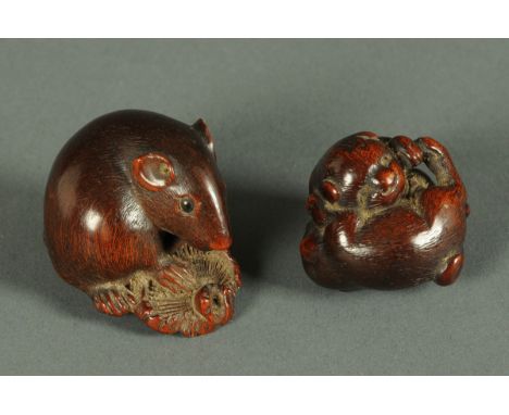 * Two Japanese wooden netsukes, one carved, two puppies and with signature, the other a mouse and mushroom also signed (see i