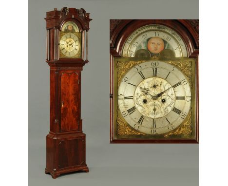 A George III mahogany longcase clock, with swans neck pediment with blind fretwork carving above the 14 inch arched brass dia