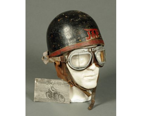 A vintage motor cycle helmet, Jap, formerly the property of Versey Graham, and a pair of goggles.