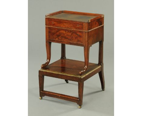 A George III mahogany stand, with three-quarter gallery to the hinged lid opening to an interior fitted for writing implement