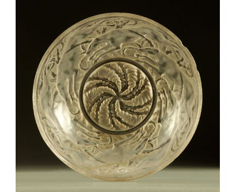 A Lalique glass bowl, decorated with hounds, signed in script to base "R. Lalique" and with stamp to centre of bowl.  Diamete