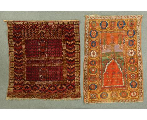 * Two Afghan rugs, mounted as wall hangings.  Widest 120 cm x 132 cm excluding fringe (see illustration). CONDITION REPORT: T