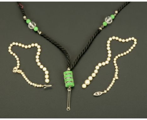 A single strand of graduated pearls, with 9 ct gold clasp, and an Art Deco style crystal and jade cord pendant.