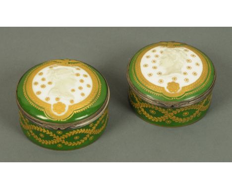 A pair of Sevres porcelain cylindrical caskets, relief moulded with Napoleon and Josephine, circular, with metal mounts and h