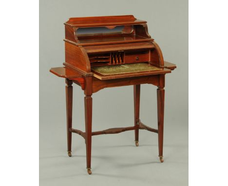 An Edwardian mahogany cylinder bureau, with rear upstand with  open shelf and tambour front with sliding writing surface, gre