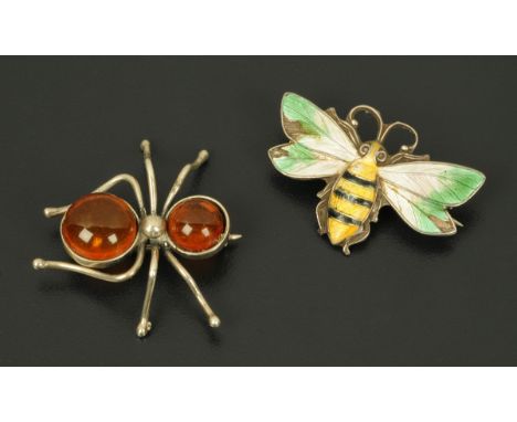 A 925 silver and cabochon amber spider brooch, circa 1960, and an American silver and enamel bumble bee brooch.