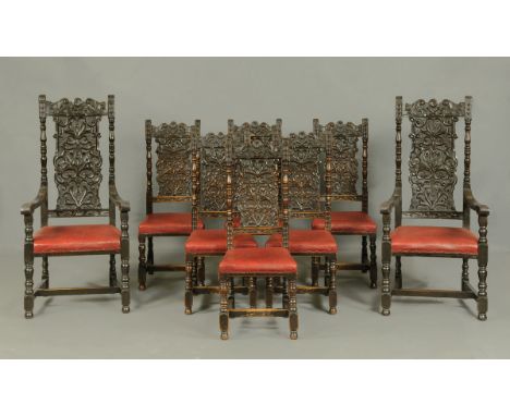 A set of two carver arm and six single late 19th century oak dining chairs, each with carved top rail, splat and turned stile