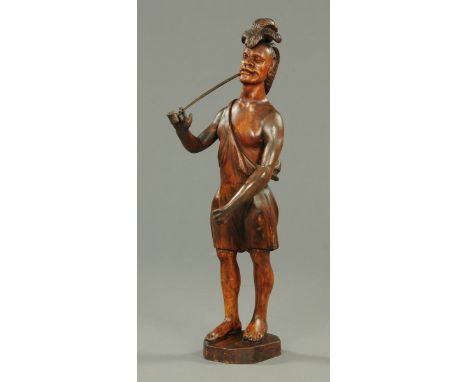 A 19th century carved wooden tobacconists figure, standing pose, American.  Height 80 cm (see illustration).   CONDITION REPO