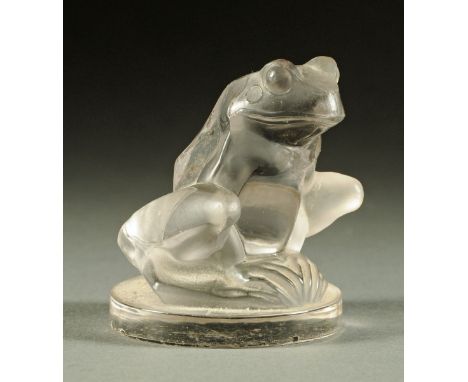 A Lalique glass car mascot in the form of a grenouille, signed "R. Lalique, France" in script to edge of base.  Height 6.1 cm