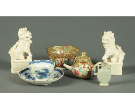 * Two Chinese Dehua Fo dog joss stick holders, height 12.5 cm, and a miniature 19th century Cantonese teapot, tea bowl, blue 