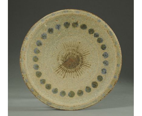 * Eric James Mellon (1953-2006), a shallow circular dish, with band of blue spots and central brown star, signed and dated 19