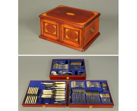 An Edwardian inlaid mahogany canteen of cutlery, Rogers, Sheffield, twelve place settings.  CONDITION REPORT: The canteen is 