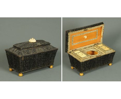 A 19th century Anglo-Indian carved horn and bone tea caddy, large form, with two interior lidded caddies, centre aperture for