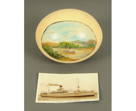 A painted ostrich egg, S.S. City of Nagpur June 1939, with information regarding the vessel and accompanying postcard.  