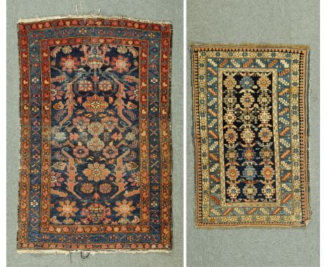 * Two rugs, one Hamadan, 100 cm x 145 cm, with foliate pattern to blue ground rectangular centre panel and with three line bo