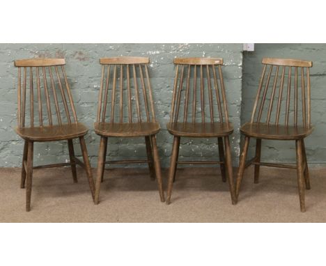 Four retro Ercol style spindle back dining chairs.