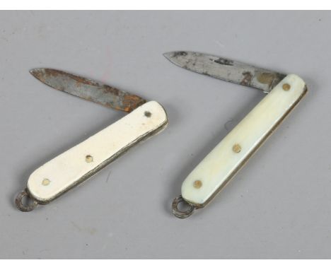 Two 19th century novelty miniature folding pocket knives, one with ivory scales.