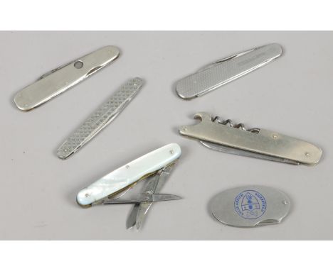 Six folding pen knives one with mother of pearl scales.