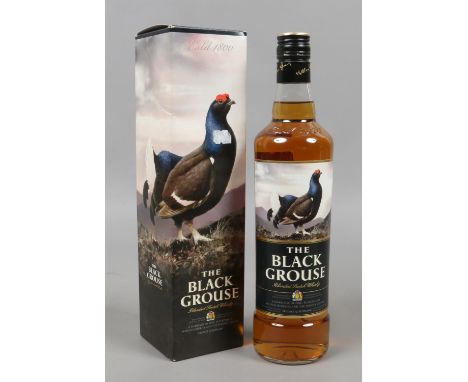 A boxed and sealed 700ml bottle of The Black Grouse blended Scotch Whisky.