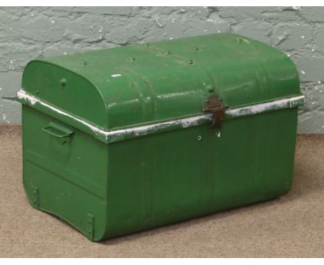 A painted tin travelling trunk.
