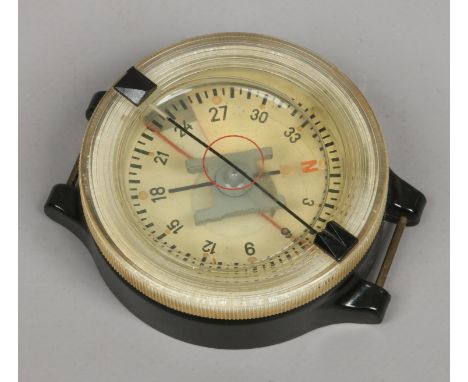 A World War II Luftwaffe navigation wrist compass serial number AK39 FL 23235-1.                                             