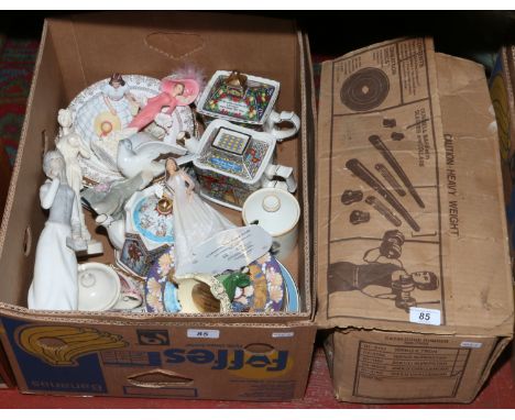 A box of miscellaneous to include Sadler, Spode, Lladro style figures etc along with a boxed dumbell set.