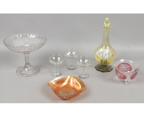 A group of glasswares to include carnival glass, Babycham glasses, coloured glass decanter etc.