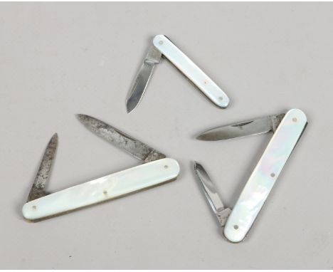 Three folding pocket knives with mother of pearl scales.