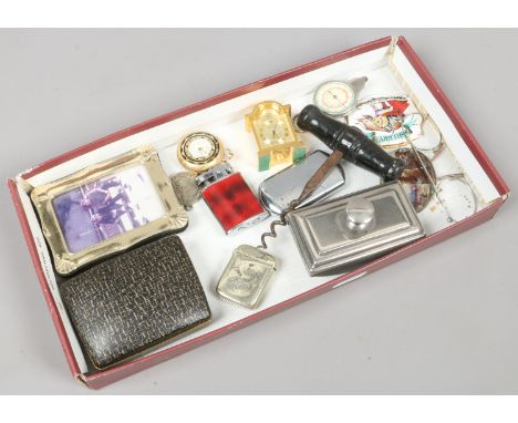 A box of collectables including corkscrew, vesta case, German compass / cm to km measurer, cufflinks and desk blotter etc.