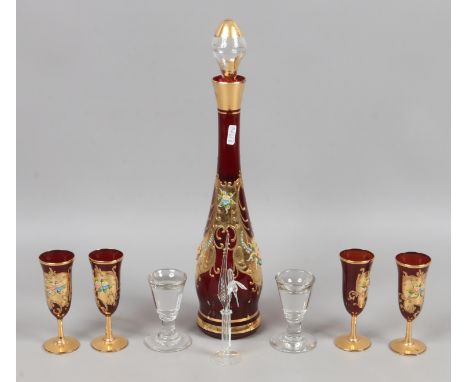 A quantity of collectable glass including a ruby and gilt decanter and four glass set along with two penny licks and stem vas