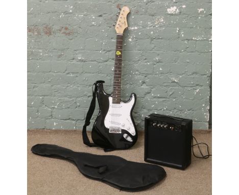 A cased elevation six string electric guitar and Clarity 20w amplifier.