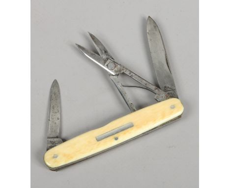 A multi tool folding pocket knife Harrison Bros & Howson with ivory scales.