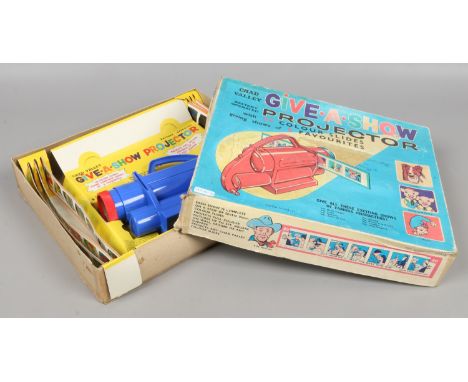 A boxed Chad Valley 'give a show' projector with eight 35mm strips of seven picture slides to include Pinky and Perky, Noddy 