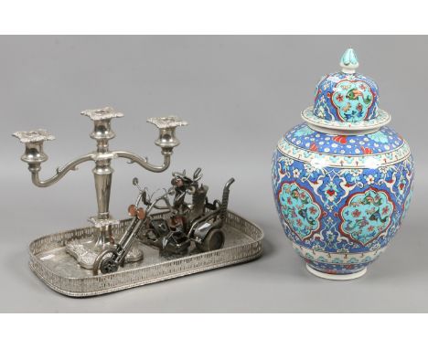 An Iznik style jar along with a silver plate serving tray and candelabra, along with a decorative model of a Harley Davidson.