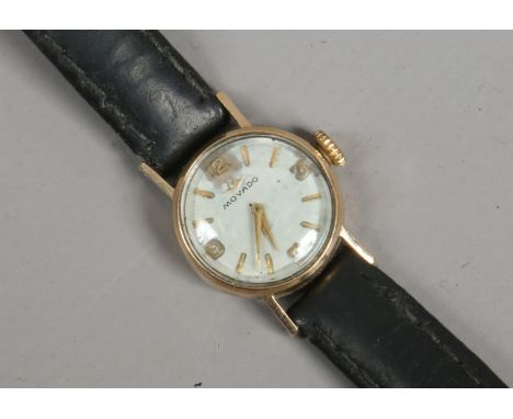 A ladies 9ct gold Movado manual wristwatch. Condition Report. To be used as a guide only. Not running.