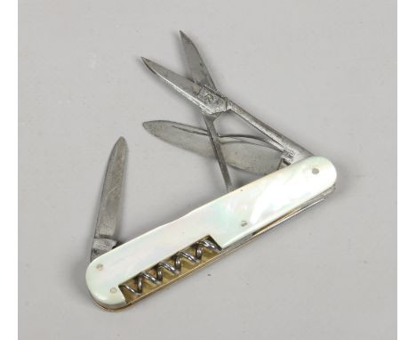 A multi tool folding pocket knife Potter Sheffield, With mother of pearl scales.