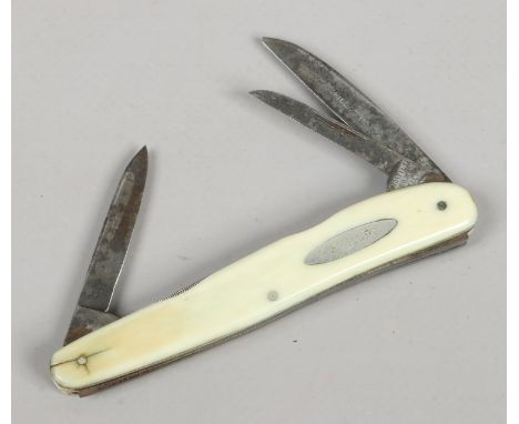 A multi tool folding pocket knife, Nowill & Son Sheffield. With ivory scales and name plate for E. Fuller.