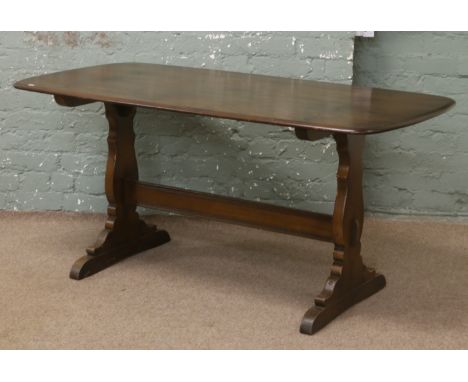 An Ercol refectory table.