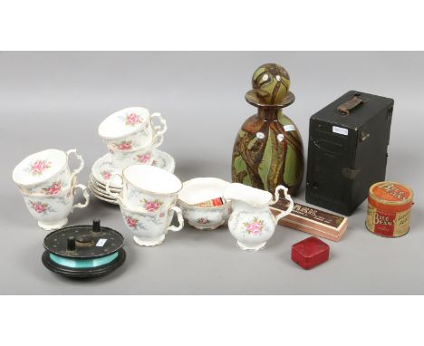 A Royal Albert six place teaset in the Tranquility pattern, Mdina bottle, harmonica, box camera, centre pin reel and vintage 