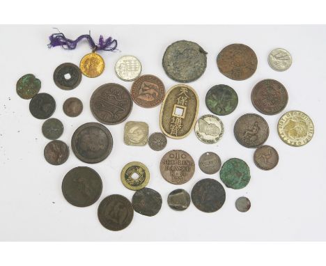 A selection of coins including a Danish 1 skilling 1771, Japanese coin, Egypt, etc.