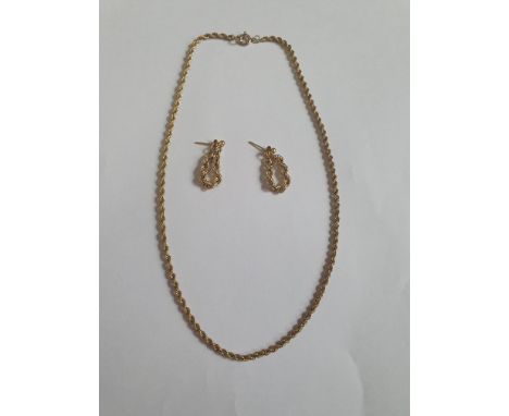 A 9ct gold rope twist chain with secure C-sprung clasp along with a pair of 9ct rope twist chain hoop earrings, butterflies s