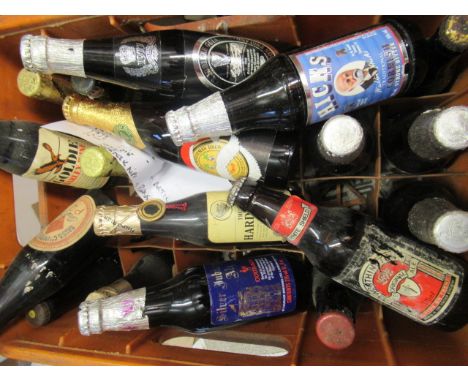 Thirty six bottles of vintage and collector's ale, including 3 Guinness 1977 Jubilee ale, 14 Guinness 1982 Christmas ale, a b