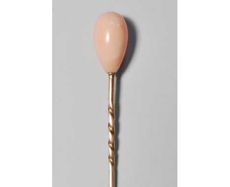 A coral set, yellow metal stick or hat pin, within original box 
