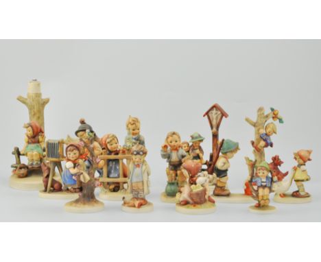 Collection of fourteen Goebel Hummel figures.